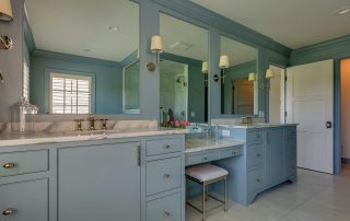 Bluish grey vanity with cream marble top is one of the best cabinet paint color combination